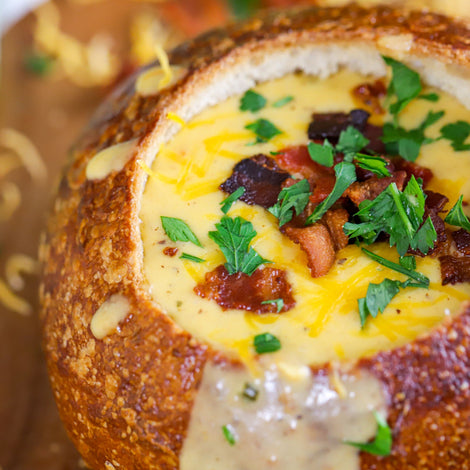 beer cheese soup in a bread bowl
