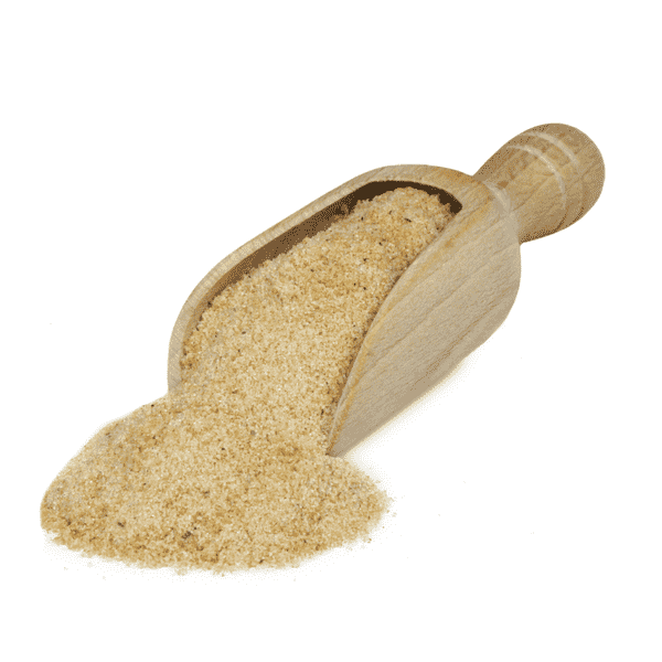 Scoop of seasoning and spices used to make BBQ Bacon Snack Sticks