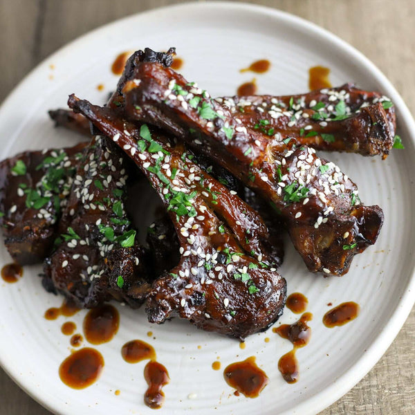 A plate of Thai Fighter Goat Chops