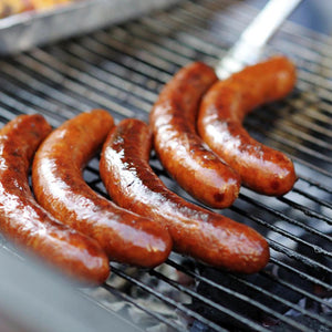 Hot Italian Sausages being made on the grill.