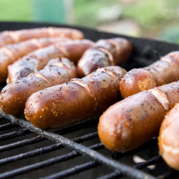 Tailgater Brats on the grill. Made using PS Seasoning's Tailgater Bratwurst Seasoning.
