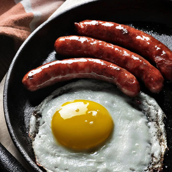 Eggs and Southern Pork Sausage in a pan.