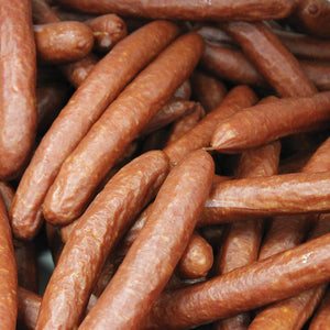 Pile of Cooked Wieners made with PS Seasonings Weiner Seasoning.