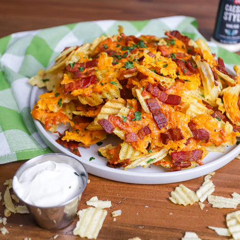 potato chips covered in cheese and bacon