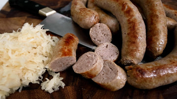 german sausage and saurkraut on a platter