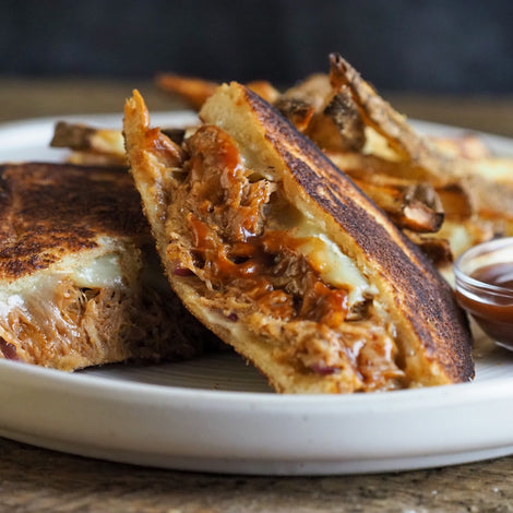 Peach Whiskey Brie Pulled Pork Sandwich