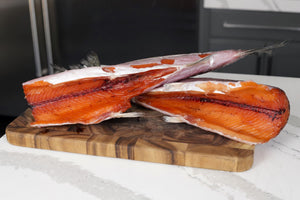 Dry aged salmon fillet on a cutting board