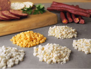 High temp cheese as a specialty ingredient to enhance summer sausage and snack sticks from PS Seasoning