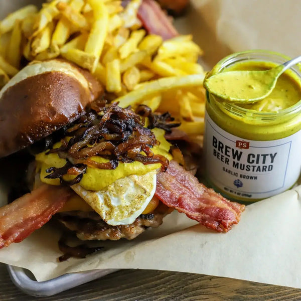 A burger with Brew City Beer Mustard on it