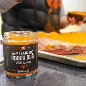 Smoky Texas Rodeo Rub BBQ brisket seasoning next to food