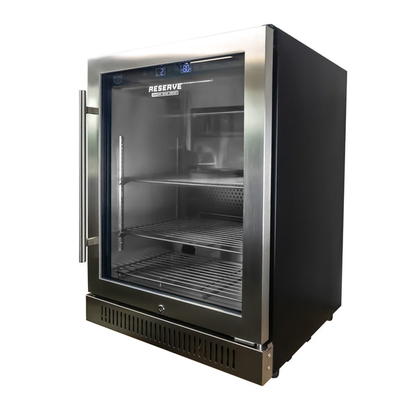 Reserve 100 home dry aging cabinet — angled left view of the freestanding cabinet showing the locking mechanism and stainless steel exterior