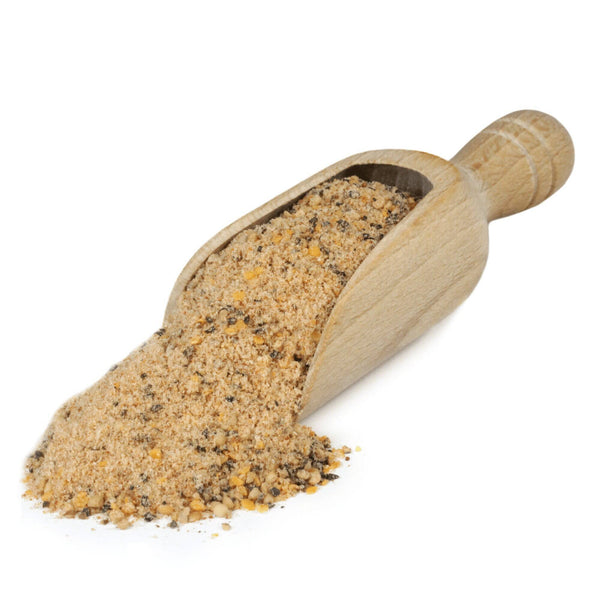Scoop of Garlic and herb seasoning used to make a garlic summer sausage.