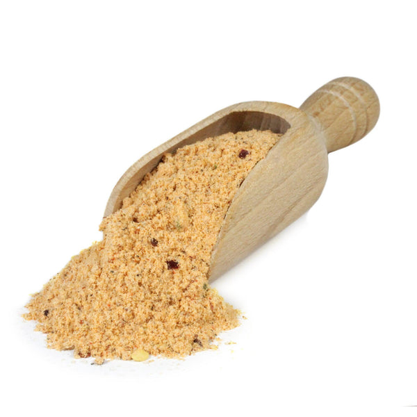 Scoop of spices used to make Seven Pepper Snack Sticks