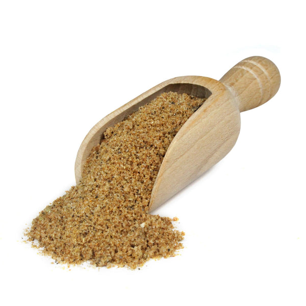 A scoop of seasonings and spices used to make Bloody Mary Snack Sticks