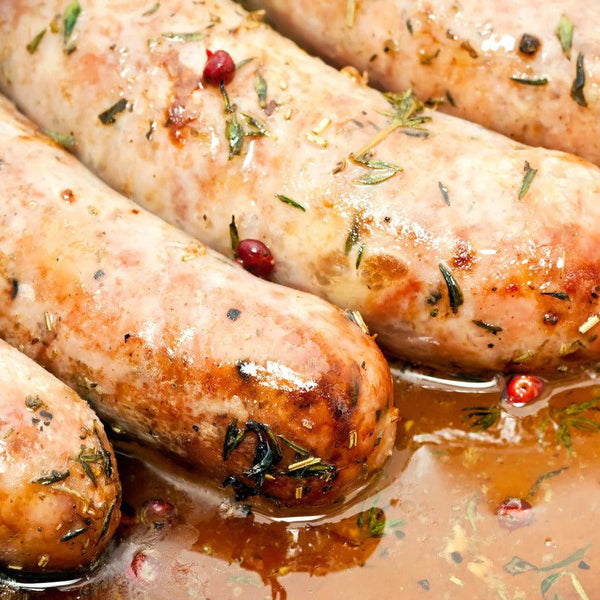 Multiple Butter Garlic Brats soaking in the juice. 