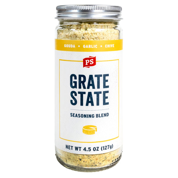 Jar of 'Grate State' seasoning blend with a white label on a white background