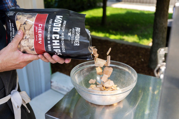 PS Seasoning Pro Smoker premium smoking wood chips — Cherry being put into a bowl