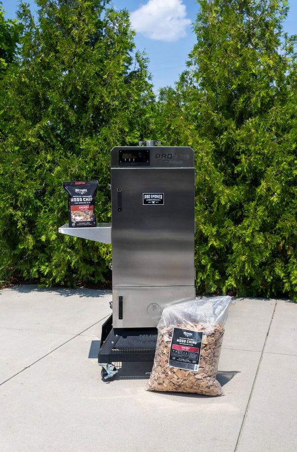 PS Seasoning Pro Smoker premium smoking wood chips — Cherry in both sizes next to a Pro Max 100 S vertical electric smoker