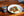 Honky Tonk - Nashville Hot Seasoning in jar next to dish