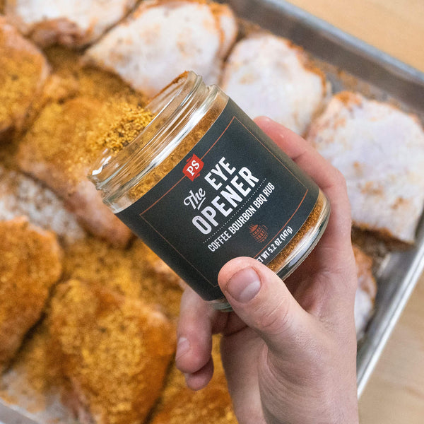 PS Seasoning The Eye Opener Coffee Bourbon BBQ Rub shaken on pork