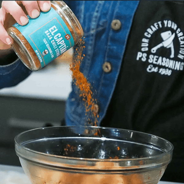 El capitan seasoning sprinkled on taco meat - PS Seasonings