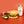 The Works Everything but the Burger Seasoning with a hamburger and pickles