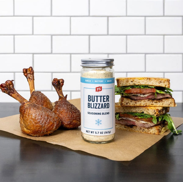 Butter Blizzard Seasoning Blend with chicken legs and sandwiches