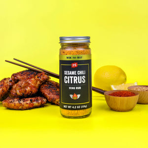 Sesame Chili Citrus Wing Rub in bottle with chicken wings
