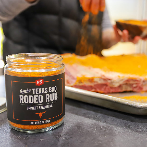 Rodeo Rub Texas BBQ Brisket Rub along a beef rib rack