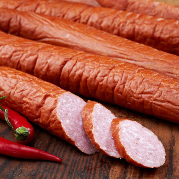 Cut up log of Hot Andouille Sausage followed by 4 full logs.