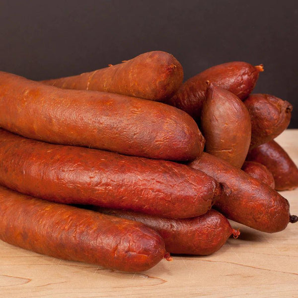 Pile of Smoke Roasted Sausages made with PS Seasonings Smoke Roasted Sausage Seasoning.