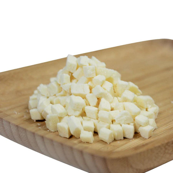 PS Seasoning & Spices High-Temp Swiss Cheese sitting on a cutting board.