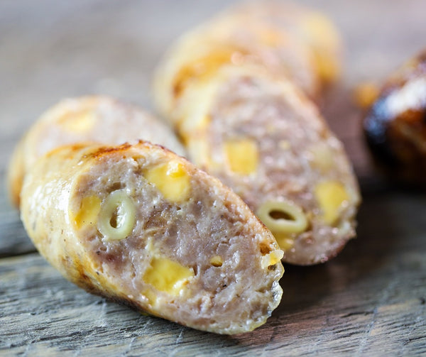 Cut in half Bacon Mac & Cheese Brat 