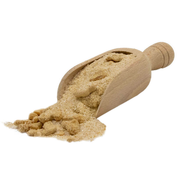 Scoop of seasoning and spices used to make Cheddar Apple Snack Sticks.